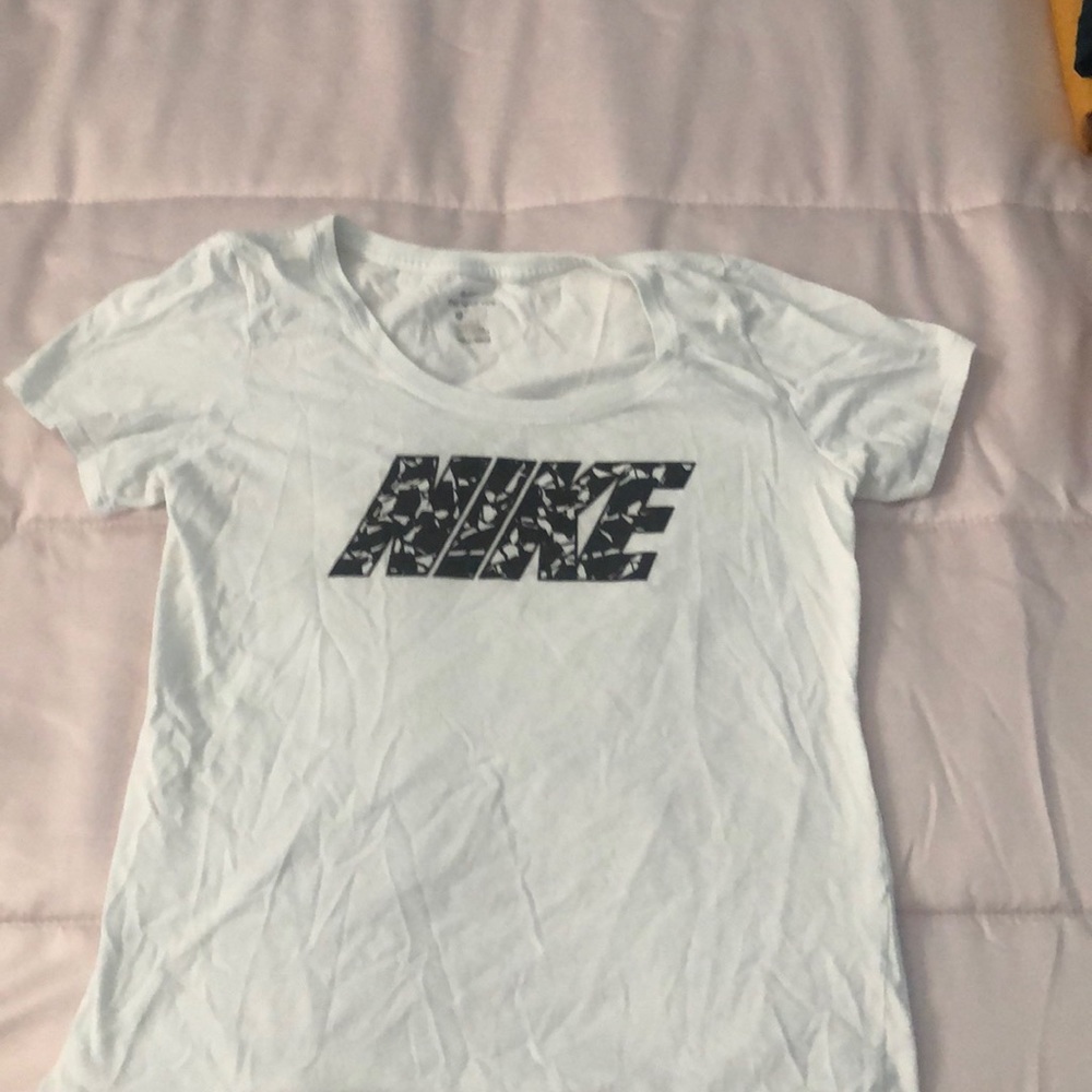 White and black nike shirt